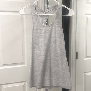 Lululemon yoga tank. Size: 6. Color: white/light gray stripe.